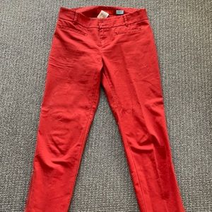 Rust colored crop pants.